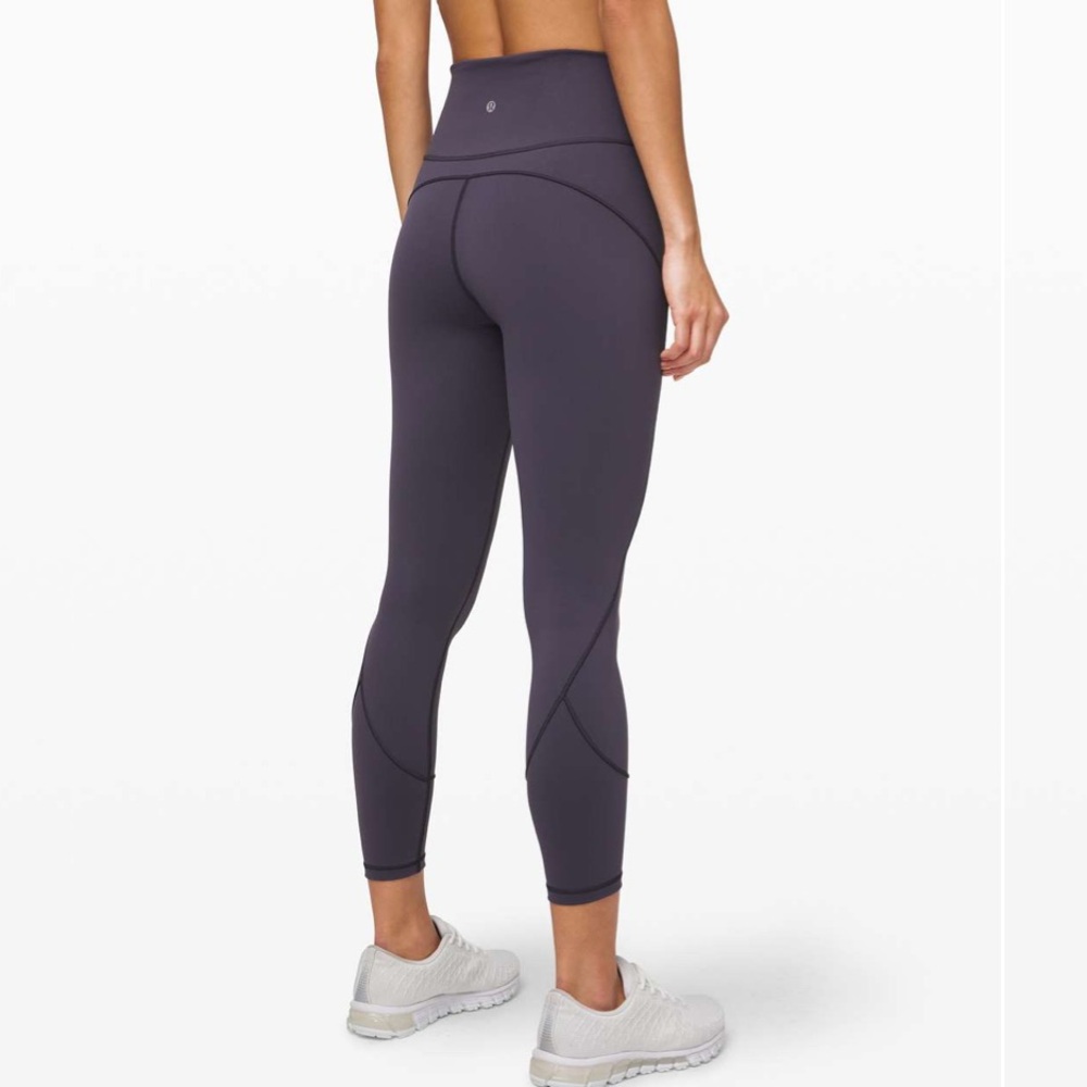 Lululemon in movement purple tight leggings 25” size 4